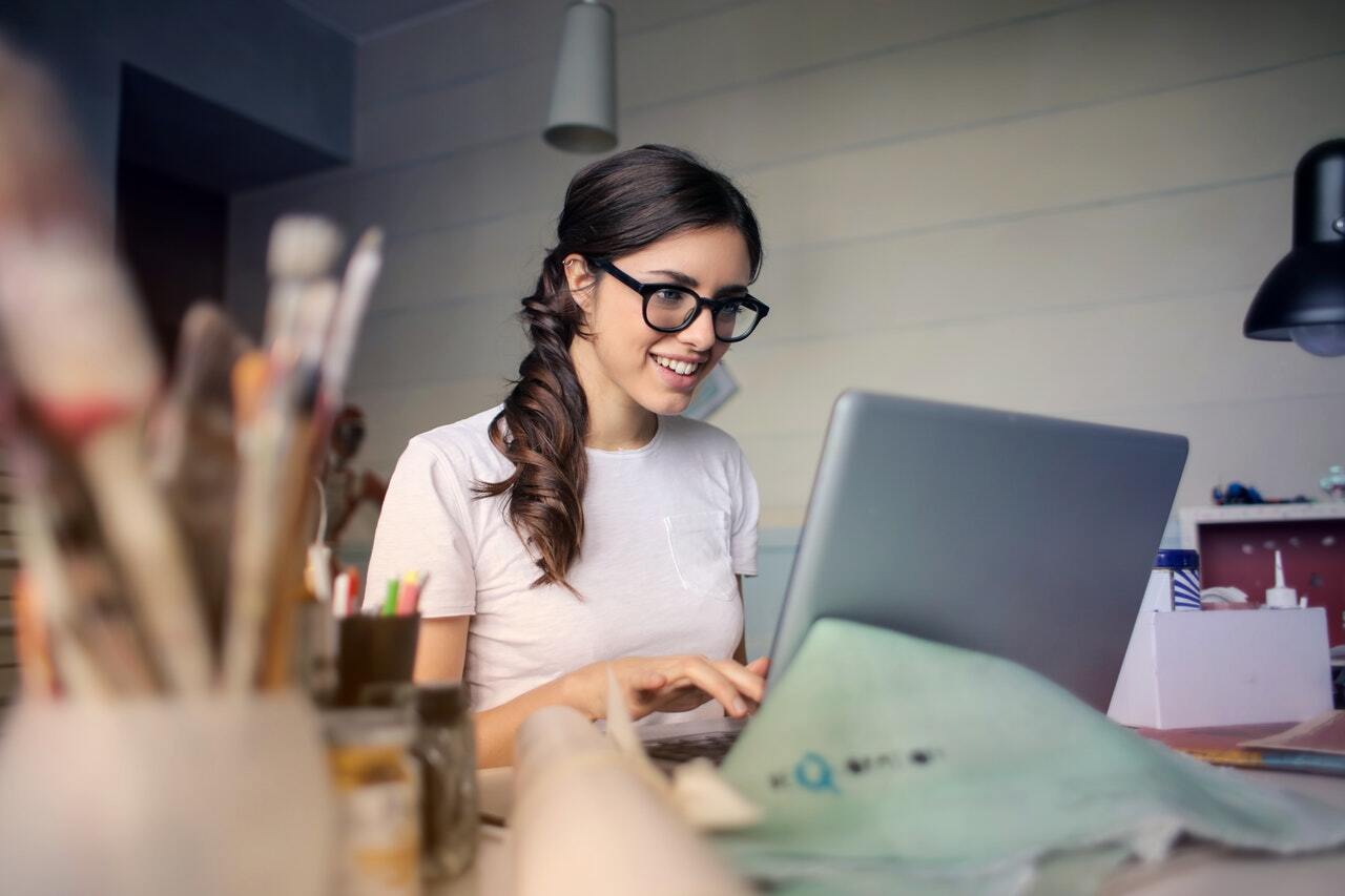 A woman typing on a computer A woman typing on a computer